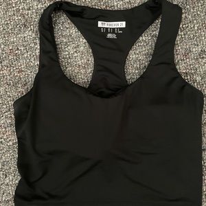 Black cropped workout top with padding
